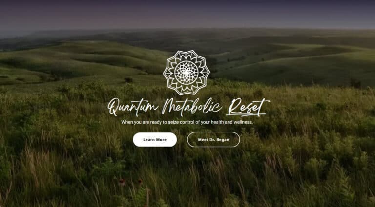 A website with the words quattro meditative retreat in the middle of a grassy field.